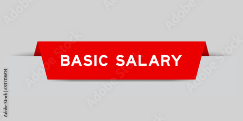 Red color inserted label with word basic salary on gray background
