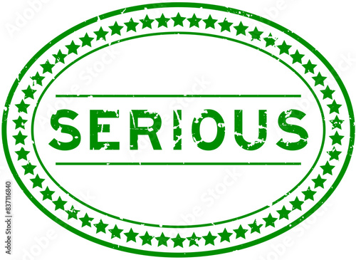 Grunge green serious word oval rubber seal stamp on white background