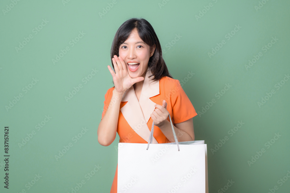 Happy woman with shopping bag shouting Happy woman with shopping bag shouting