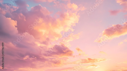 Sunset sky boasting shades of pink and orange among fluffy clouds