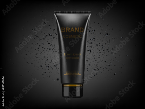 Black cosmetic plastic tube with charcoal powder explosion on black background. Charcoal detox cream or face mask, cosmetic packaging design.