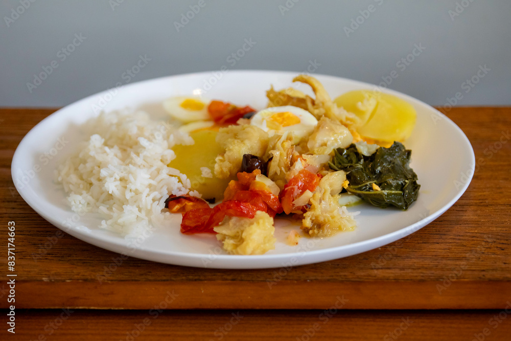 Traditional Portuguese bacalhoada with classic ingredients. When cod Oven Traditional Portuguese bacalhoada with classic ingredients. When cod Oven