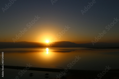 The sunrise on the shores of the Dead Sea