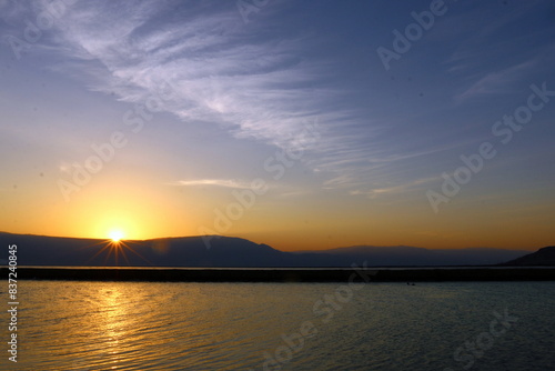 The sunrise on the shores of the Dead Sea