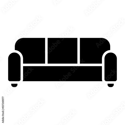 Soft sofa vector icon. Furniture sign