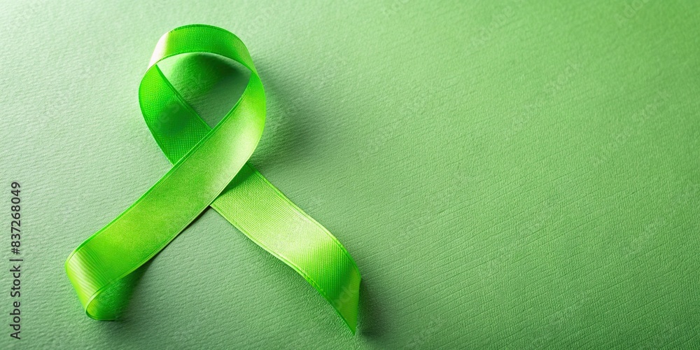 Lime green ribbon for Mental Health Awareness Month cancer day with