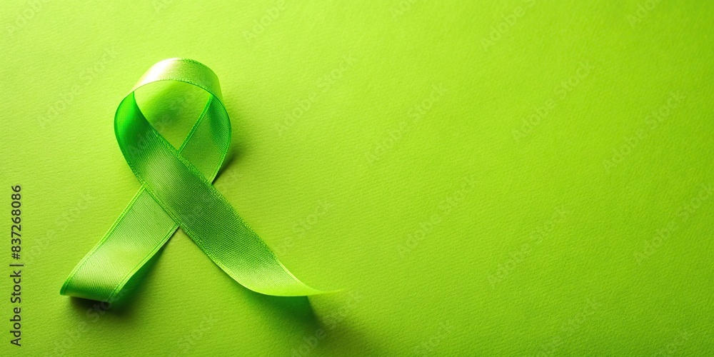 Lime green ribbon for Mental Health Awareness Month cancer day with