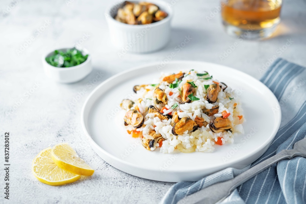 Mussels with rice and vegetables in a plate Mussels with rice and vegetables in a plate