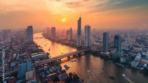 Aerial view Bangkok City skyline and skyscraper on Sathorn Road business and financial in Bangkok downtown, Panorama of Taksin Bridge over Chao Phraya River, Bangkok,  photo