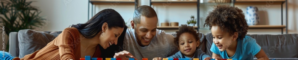 Joyful Multiracial Family Bonding Over Block Stacking Game in Living Room Joyful Multiracial Family Bonding Over Block Stacking Game in Living Room