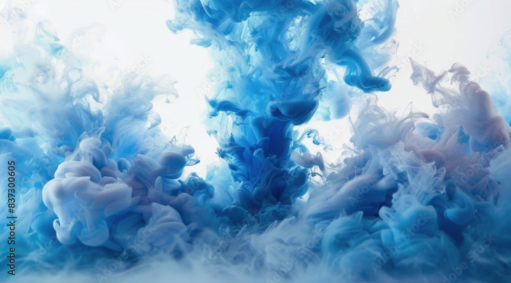 Fototapeta premium Blue And White Ink Swirling In Water