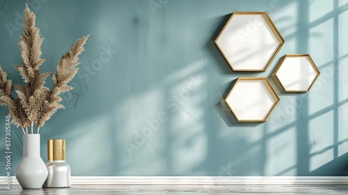 three octagonal photo frames on a light blue background with texture. The frames are arranged in a group on the wall, creating a minimalist and modern composition. The background has a heterogeneous c photo