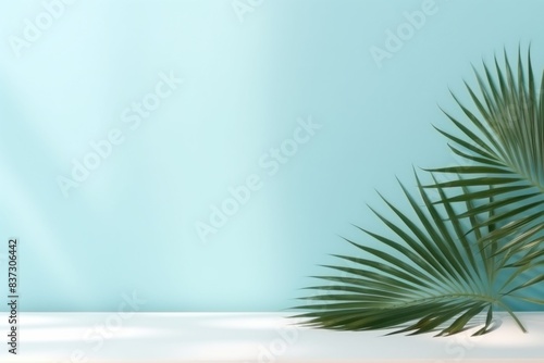 Tropical Palm Leaves Against Light Blue Background