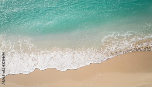 beautiful sandy beach and soft blue ocean wave 