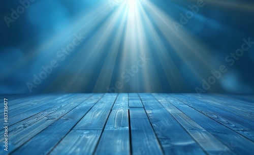 Abstract blurred blue background with wood floor and rays of light. Simple background for product presentation. Mockup empty template for displaying your products. 