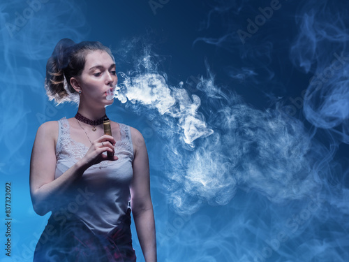 Vape cigarette in hands of ...
