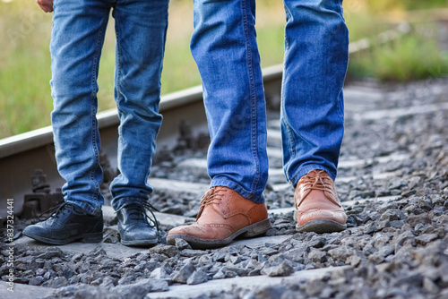 feet father and son cowboy shoes