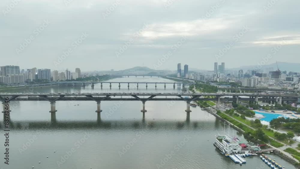Drone View of Seoul city in South Korea, Ttukseom Island, Han river subway, Summer Drone View of Seoul city in South Korea, Ttukseom Island, Han river subway, Summer