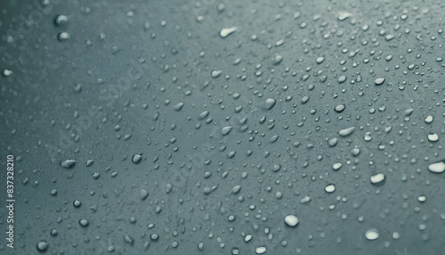 Super slow motion of falling water drops on waterproof cloth texture in detail. Filmed on high speed cinema camera, 1000 fps.