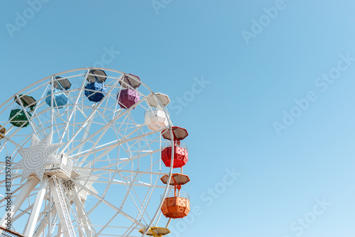 Wallpaper Mural Old colorful ferris wheel on background of blue sky. Torontodigital.ca