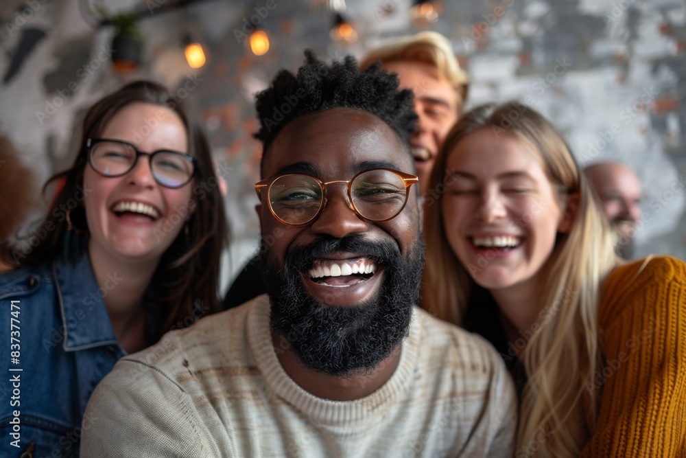 Man with glasses and beard sitting with friends in restaurant Man with glasses and beard sitting with friends in restaurant