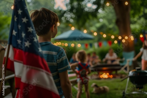 Children enjoying a backyard barbecue party during the Fourth of July celebrations.