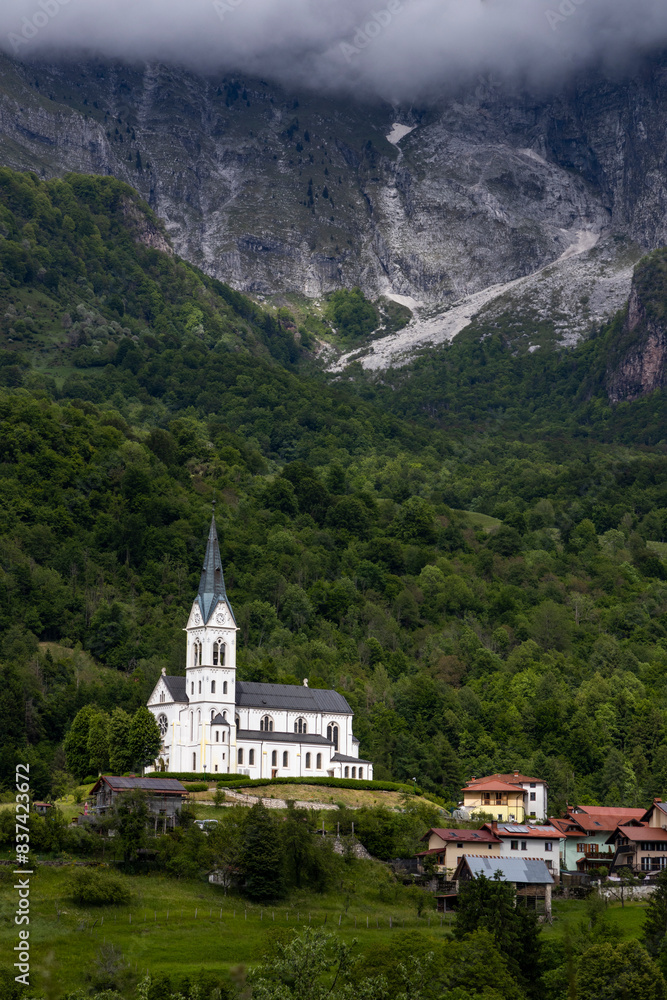 San Fermin Church immersed in the green of the Slovenian mountains a few steps from Caporetto. It remains a precious gem of Christianity and faith to be admired, makes the view of the mountain unique. San Fermin Church immersed in the green of the Slovenian mountains a few steps from Caporetto. It remains a precious gem of Christianity and faith to be admired, makes the view of the mountain unique.