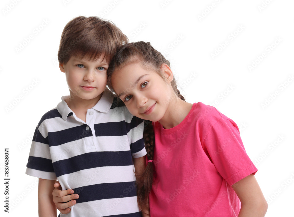Happy brother and sister hugging on white background Happy brother and sister hugging on white background