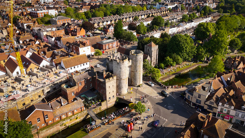 Flight over the Westgate Towers of Canterbury at the historic city centre - aerial drone photography