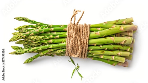 bundle of asparagus isolated on white background. clean fresh vegetables concept for deisgner photo