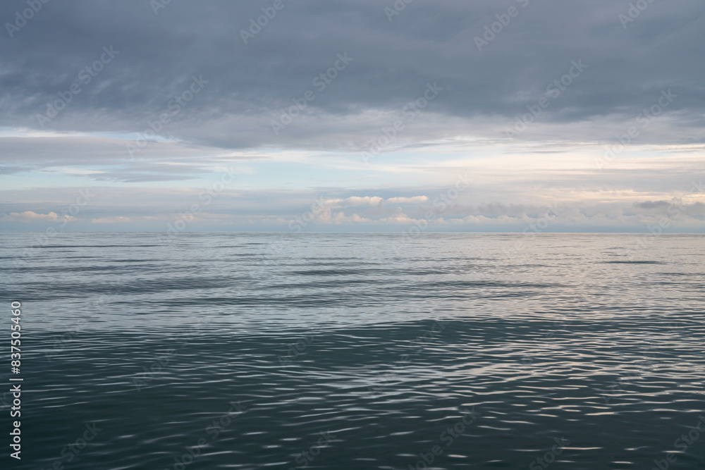 Fototapeta premium View of the Black Sea on the coast of Sochi against the sunset sky, Sochi, Krasnodar Krai, Russia