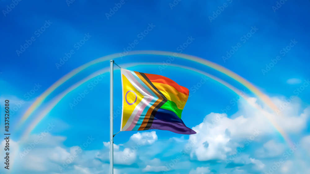 Progress Pride Flag with a blue sky and a double rainbow in the background. Rainbow Flag waving in the wind, LGBTQIA+ appreciation, Joint-Pride Flag on cloudscape double-rainbow wallpaper. Progress Pride Flag with a blue sky and a double rainbow in the background. Rainbow Flag waving in the wind, LGBTQIA+ appreciation, Joint-Pride Flag on cloudscape double-rainbow wallpaper.