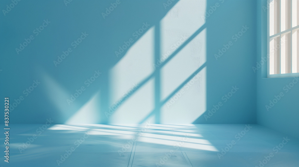 Fototapeta premium blue wall empty room with light streaming in 
