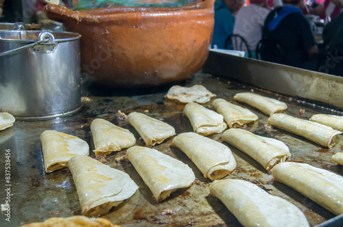 Traditional quesadillas and quesabirrias in the san juan de Dios Market, Guadalajara Jalisco. Mexico photo