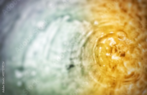 Blur of Golden and light water drop gradient image background