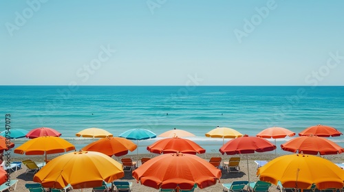 Top view of the beach with colorful umbrellas. photo