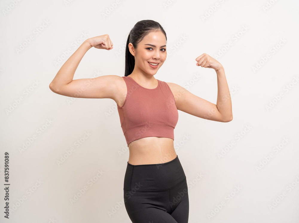 Young beautiful smiling asian woman with sportswear on isolated white background. Portrait happy healthy slim fit and firm latin attractive sporty woman standing pose exercise workout in studio.