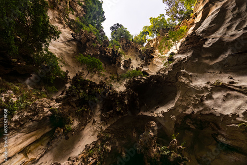 beautiful Cave with sky and Forest inside limestone cave of batu cave in Malaysia