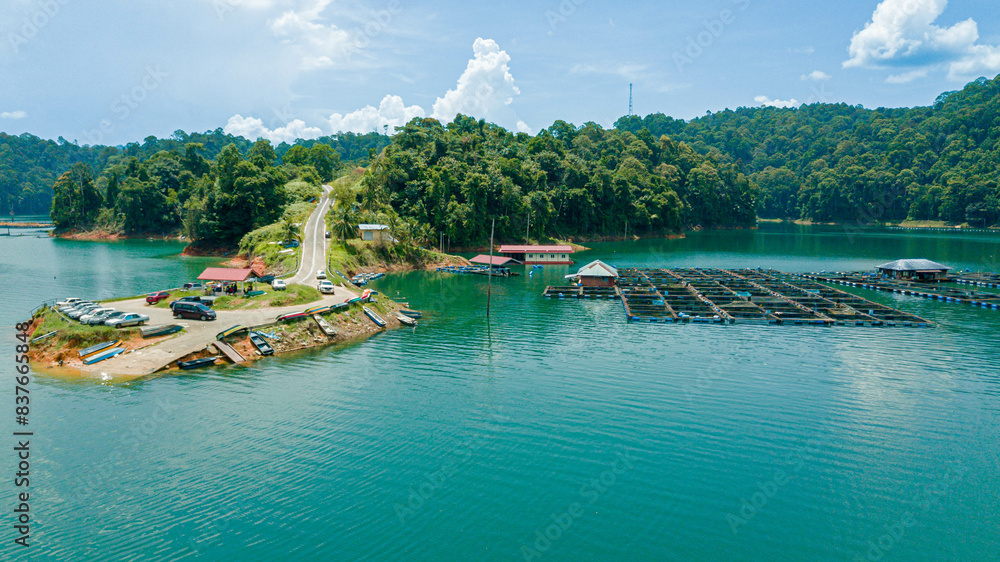 Aerial drone view of Kenyir Lake or Tasik Kenyir which is located at Kuala Berang in Hulu Terengganu, Terengganu, Malaysia Aerial drone view of Kenyir Lake or Tasik Kenyir which is located at Kuala Berang in Hulu Terengganu, Terengganu, Malaysia