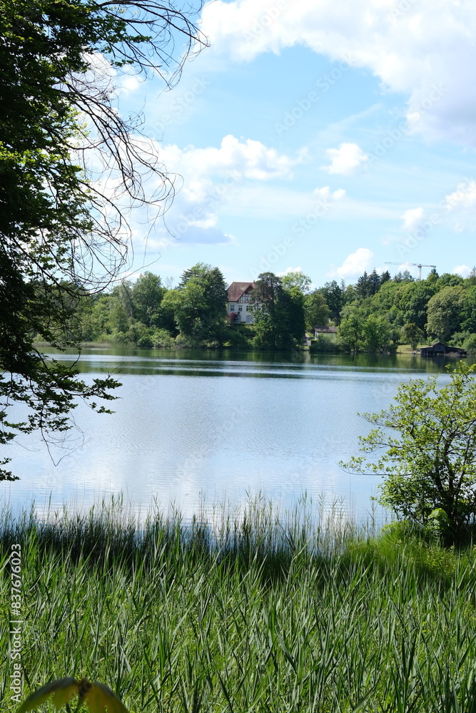 Fototapeta premium Katzensee with a blue sky in the background 