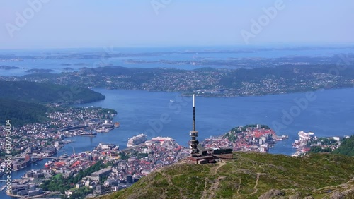 Amazing views of Bergen seen from Mount Ulriken. Beautiful summer day. Revealing the city centre and showing the fjord and the surrounding mountains. photo