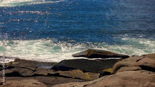 Rocky coastline York, Maine showing ocean and large granite rocks photo