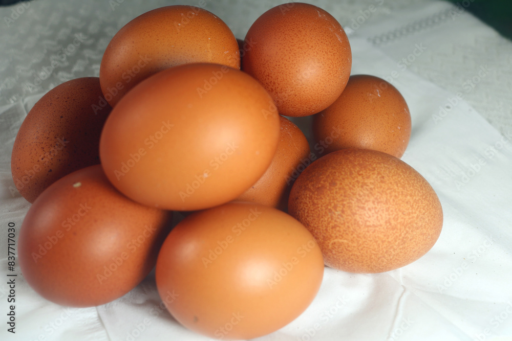 Fresh raw chicken eggs are placed in rows. Cover with tissue and water. in cardboard containers. Chicken eggs are healthy for the body. high nutritional value Fresh raw chicken eggs are placed in rows. Cover with tissue and water. in cardboard containers. Chicken eggs are healthy for the body. high nutritional value