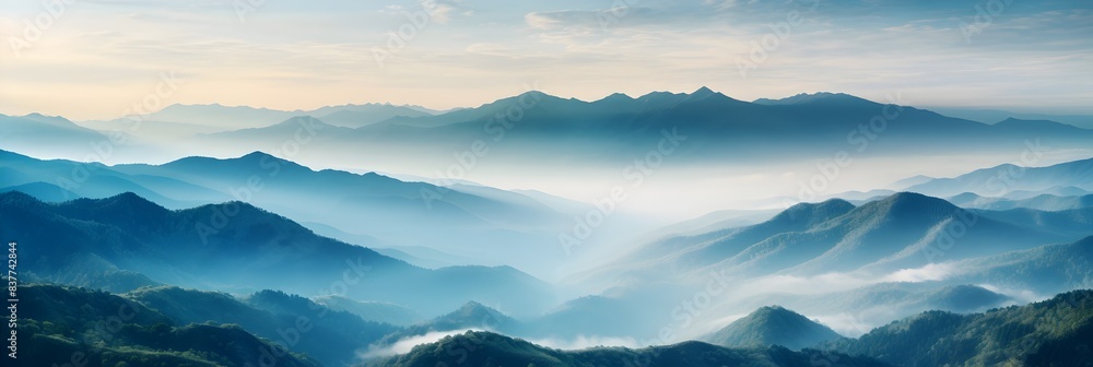 Majestic Mountain Panorama with Ethereal Mist Rising Through the Valleys Majestic Mountain Panorama with Ethereal Mist Rising Through the Valleys