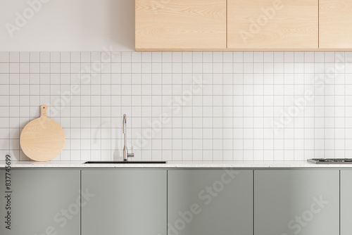 Cozy home kitchen interior with washbasin and stove, empty space