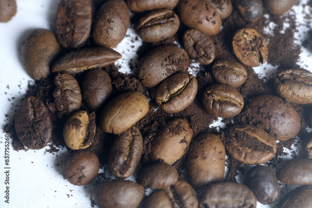 coffee beans. powder. cream. on a white background. the aroma of Sumatran coffee. arabica coffee. civet coffee. expensive and luxurious. drink lover coffee beans. powder. cream. on a white background. the aroma of Sumatran coffee. arabica coffee. civet coffee. expensive and luxurious. drink lover
