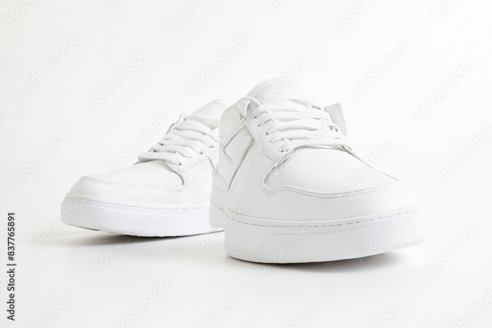 White Leather Sneakers on White Background White Leather Sneakers on White Background