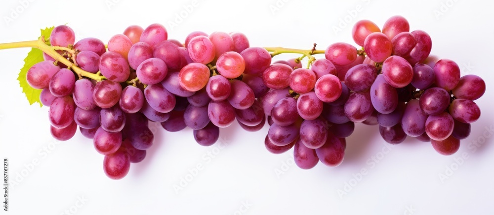 Fresh ripe juicy grapes on a white background, with space for text or images. Fresh ripe juicy grapes on a white background, with space for text or images.