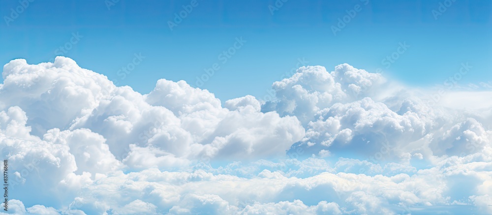 Afternoon sky filled with fluffy white clouds, ideal for a copy space image. Afternoon sky filled with fluffy white clouds, ideal for a copy space image.