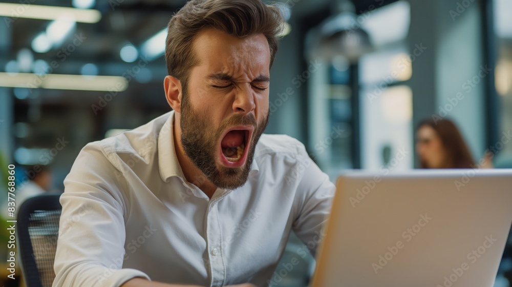 Obraz premium Businessman office worker yawn tired work at laptop mouth open wide sleepy drowsy Caucasian male in white button shirt office